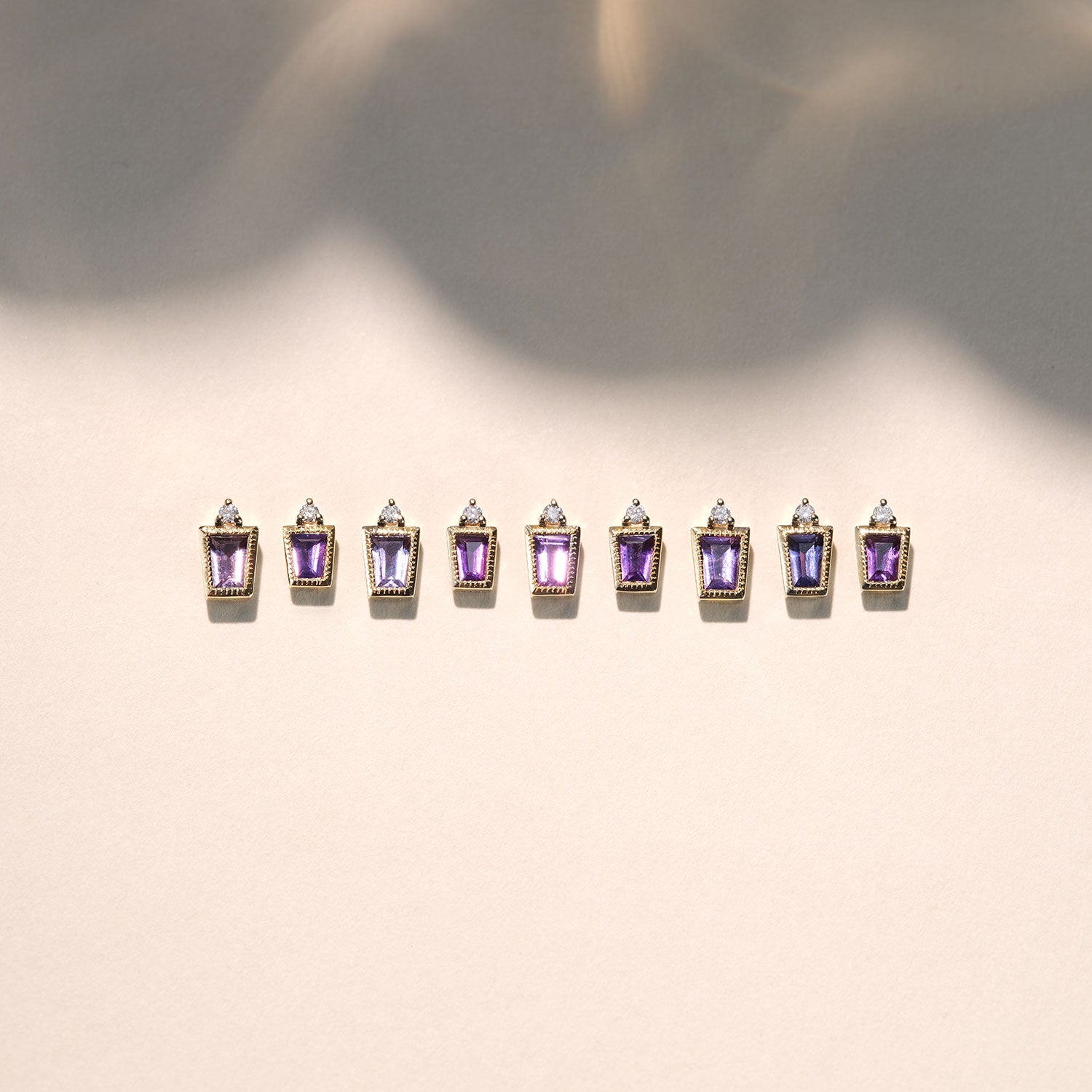Tapered Baguette Purple Sapphire with Milgrain Bezel and Diamond Accent