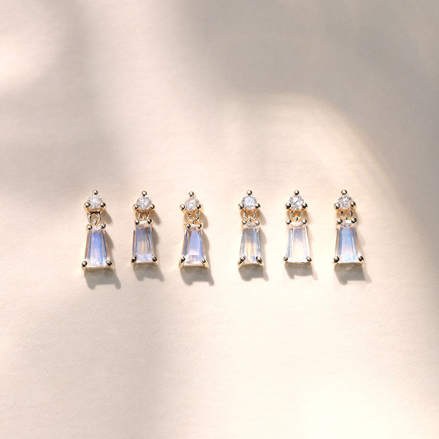 Diamond with Tapered Baguette Moonstone Dangle